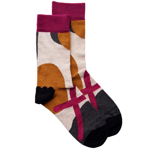 Cream sock with magenta/orange/grey abstract design, black heel/toe and magenta ankle cuff